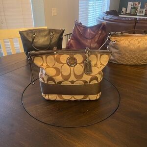 Coach like  new,  priced to sell. Clearing out my closet.